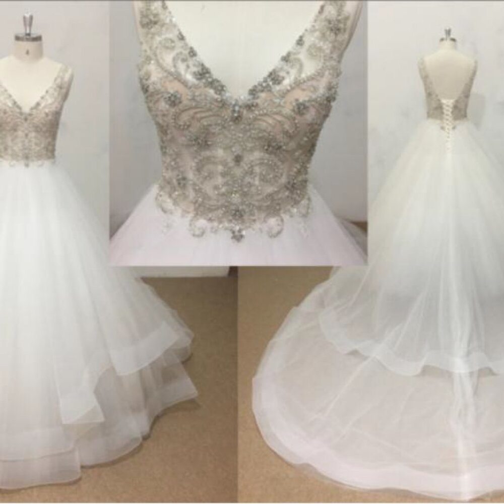 ST201 - Darius Cordell Sleeveless V-Neck Wedding Gown